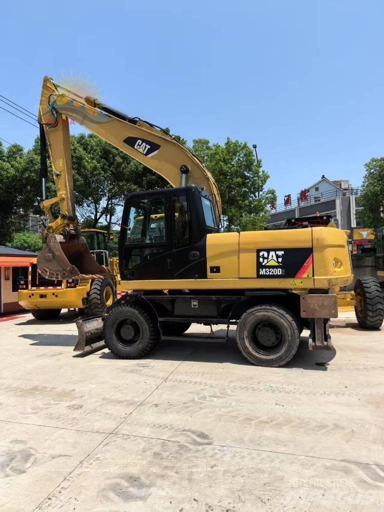 CAT M 315 D2 Gravemaskiner på hjul