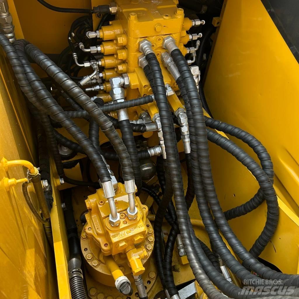 Komatsu 110 Gravemaskiner på larvebånd