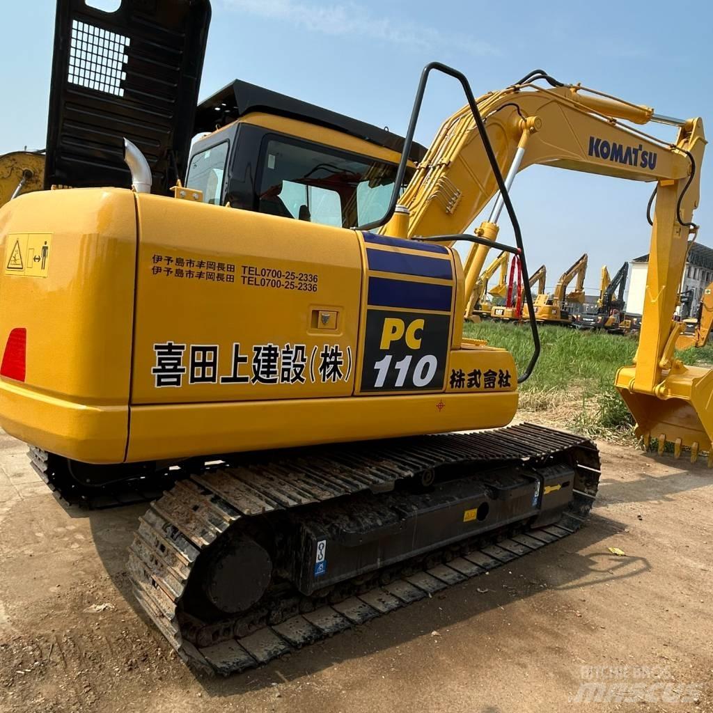 Komatsu 110 Gravemaskiner på larvebånd