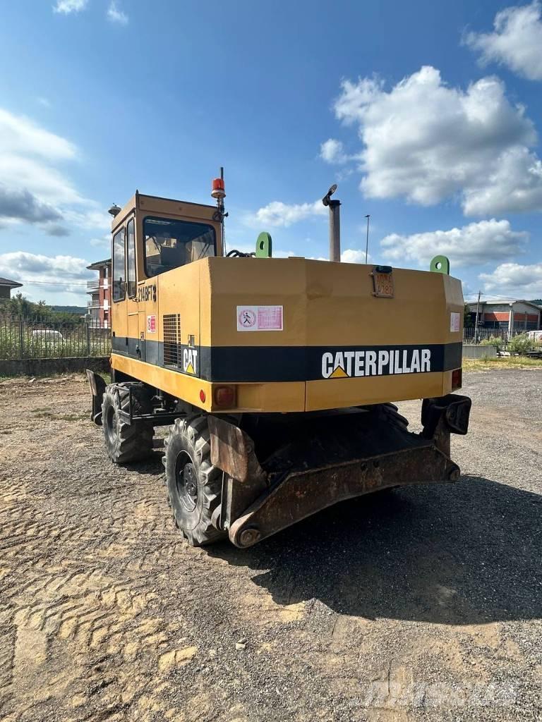CAT 214 Gravemaskiner på hjul