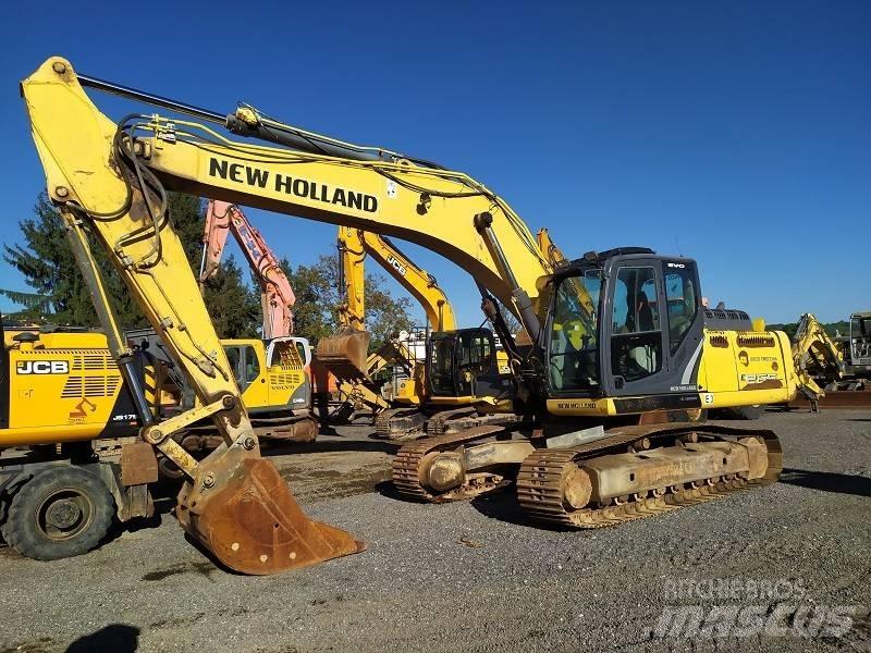 New Holland E 265 C Gravemaskiner på larvebånd