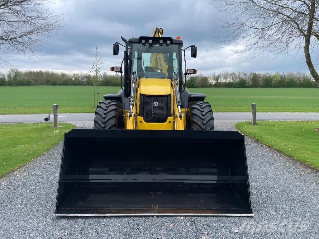 New Holland B115C Rendegravere