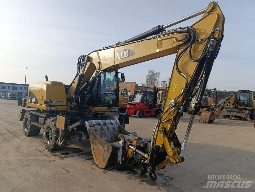 CAT M 313 D Gravemaskiner på hjul