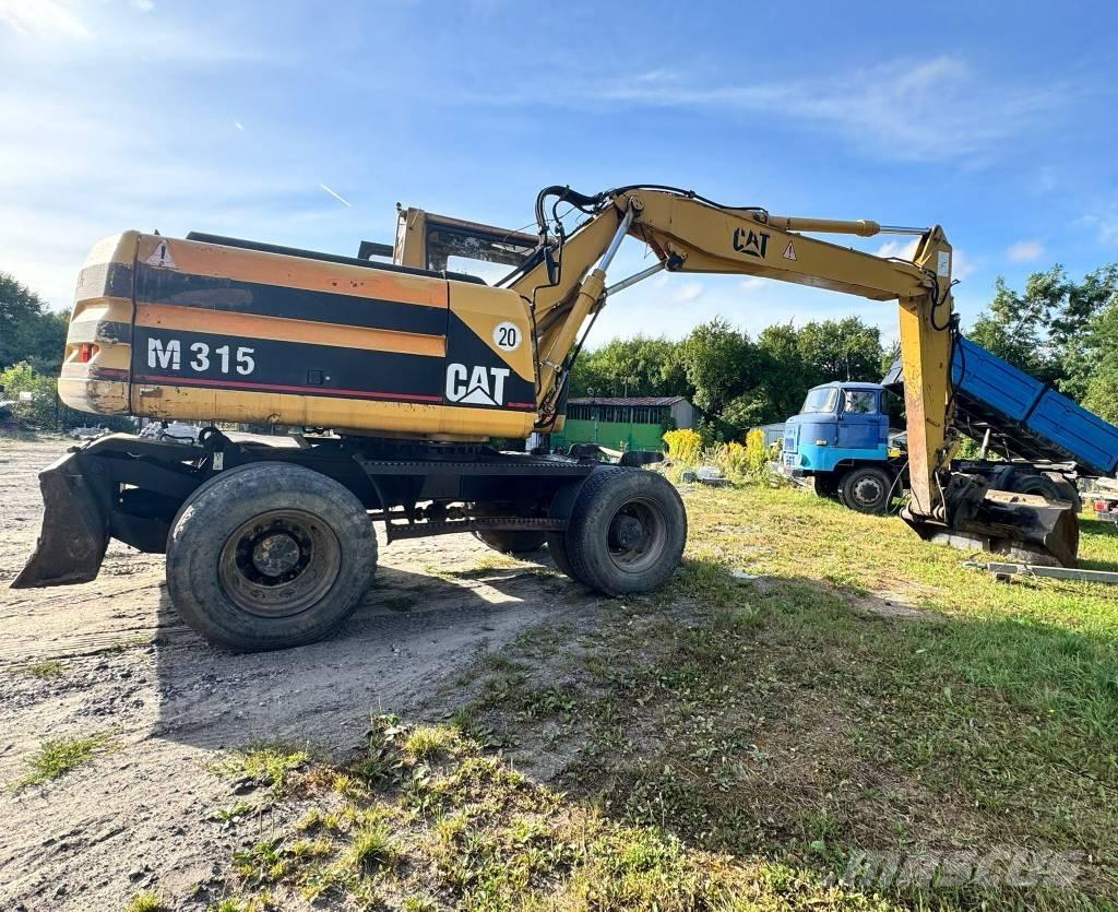 CAT M 315 Gravemaskiner på hjul