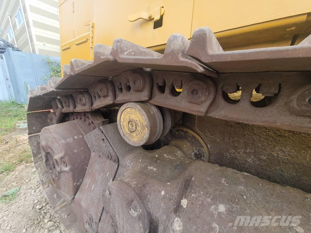 CAT 973 Larvebåndslæssere