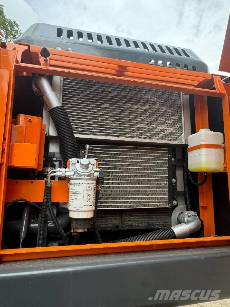 Develon DX 225 LCA Midi-gravemaskiner 7t - 12t
