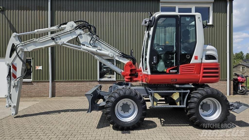 Takeuchi TB295W Gravemaskiner på hjul