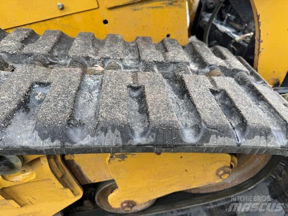 CAT 299 Minilæsser - skridstyret