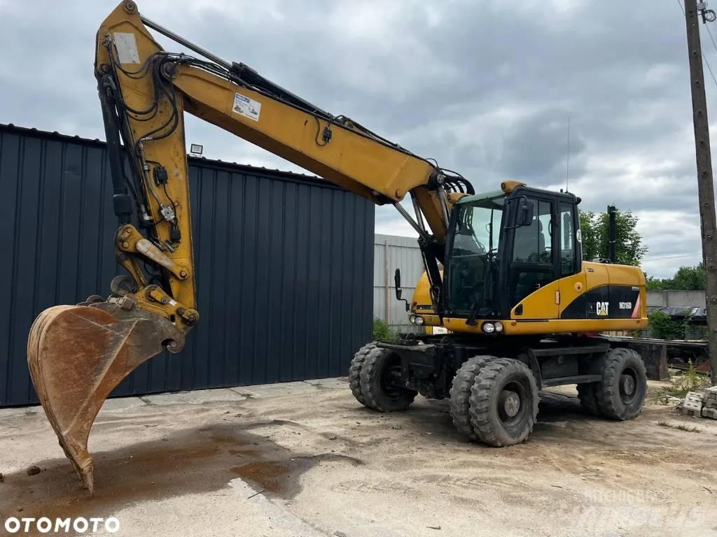 CAT M 316 D Gravemaskiner på hjul