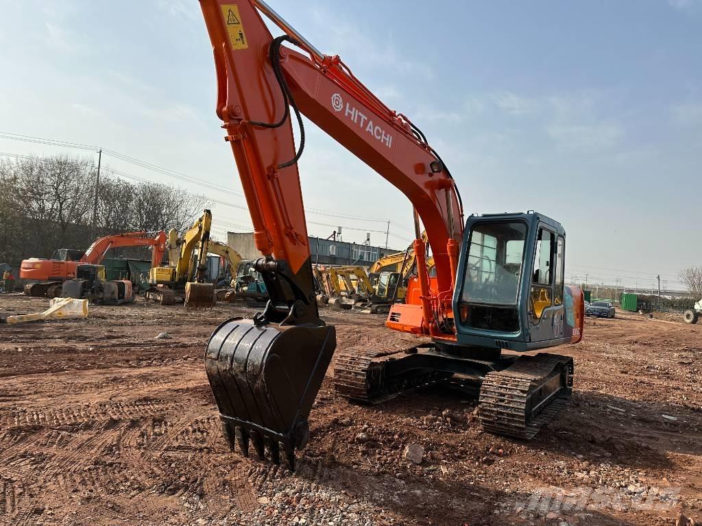 Hitachi EX 120 Gravemaskiner på larvebånd