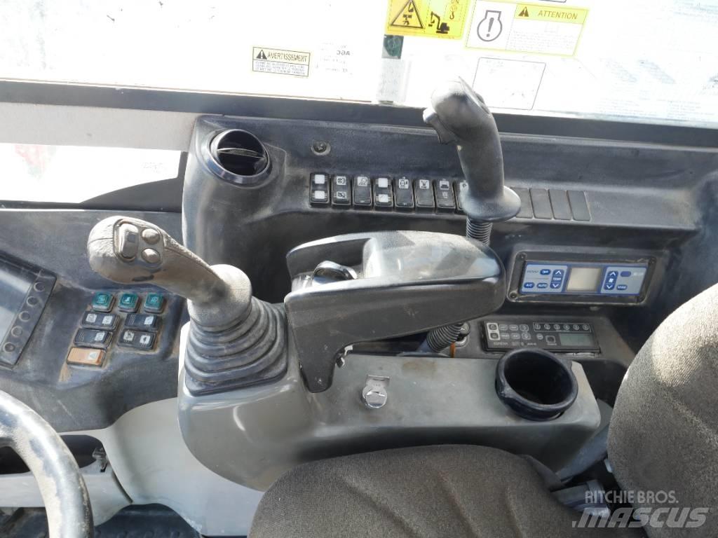 Takeuchi TB 295 W Gravemaskiner på hjul