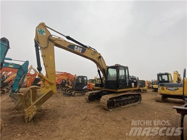 CAT 318D2 Gravemaskiner på larvebånd