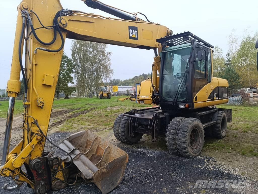 CAT M 318 C Gravemaskiner på hjul
