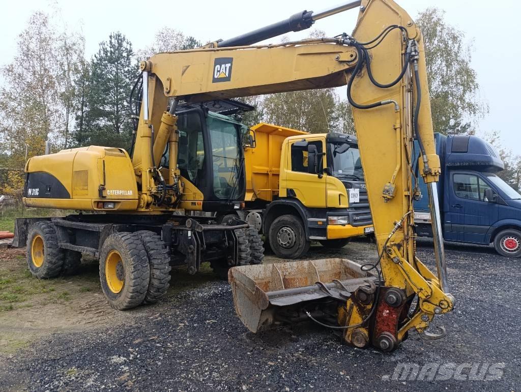 CAT M 318 C Gravemaskiner på hjul