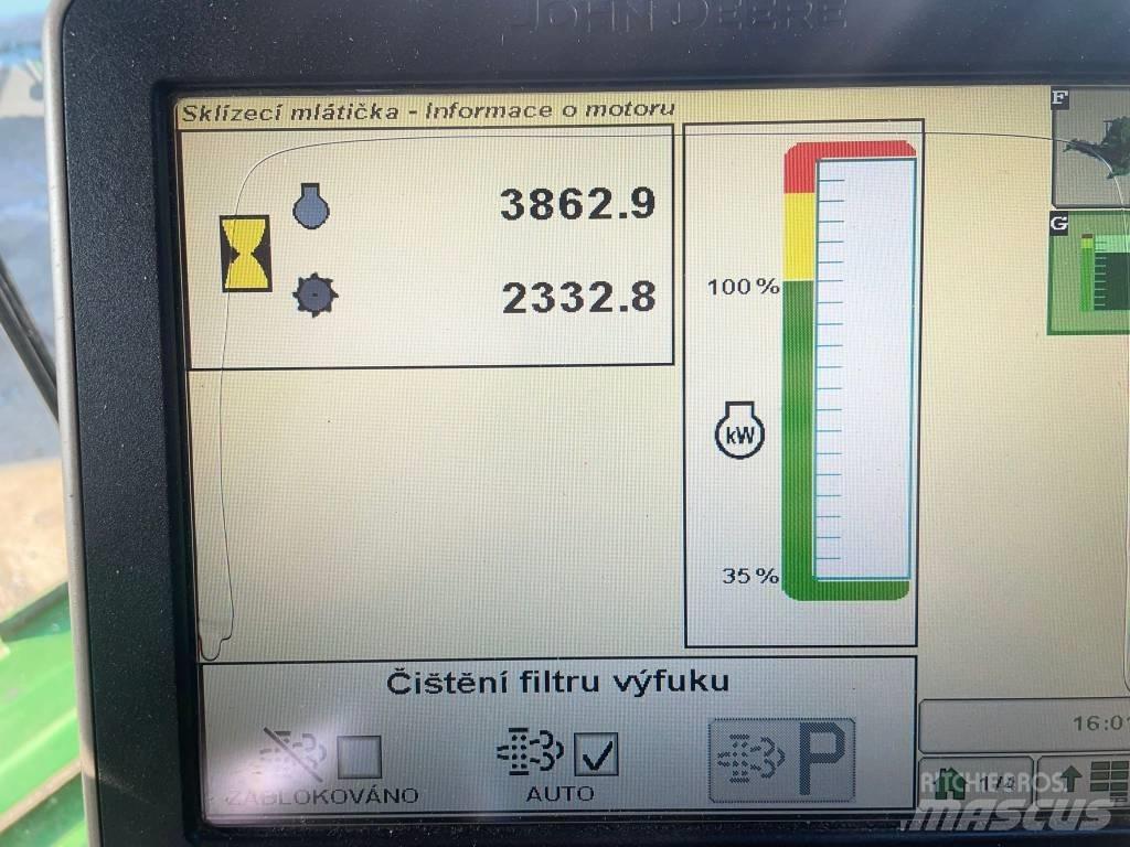 John Deere T 670 i Mejetærskere