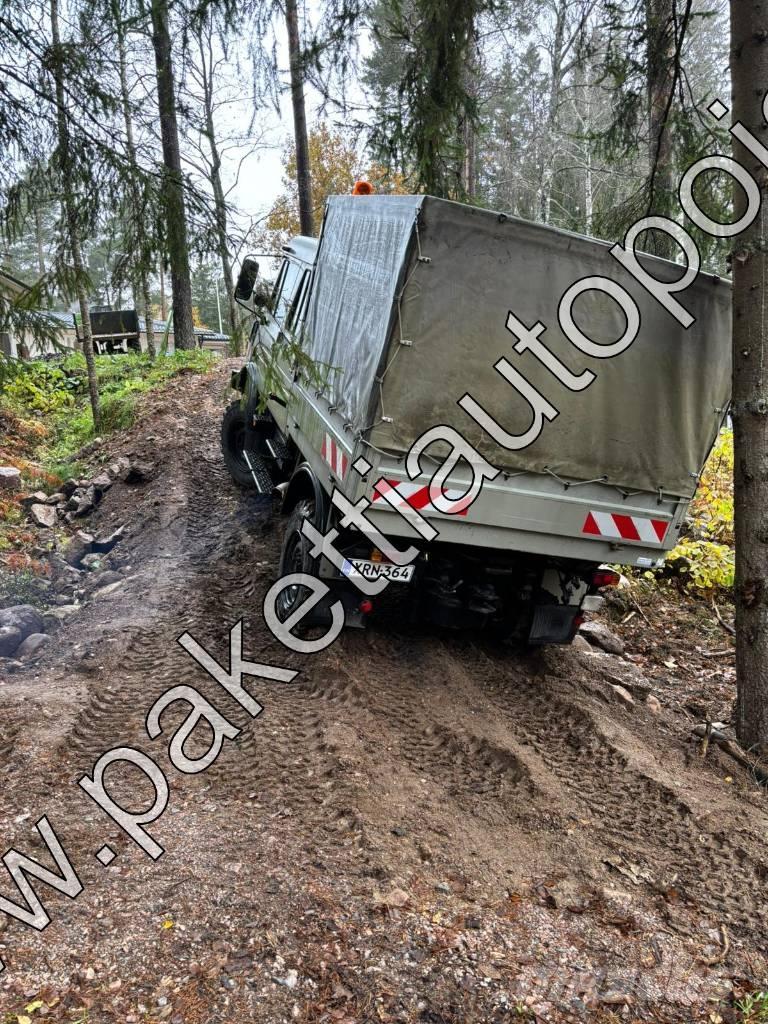 Unimog U 1250L DoKa Lastbil - Gardin