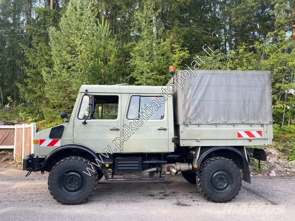 Unimog U 1250L DoKa Lastbil - Gardin