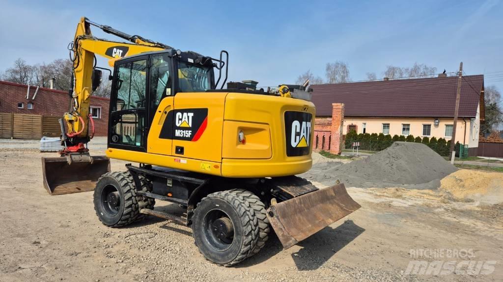CAT M 315 F Gravemaskiner på hjul