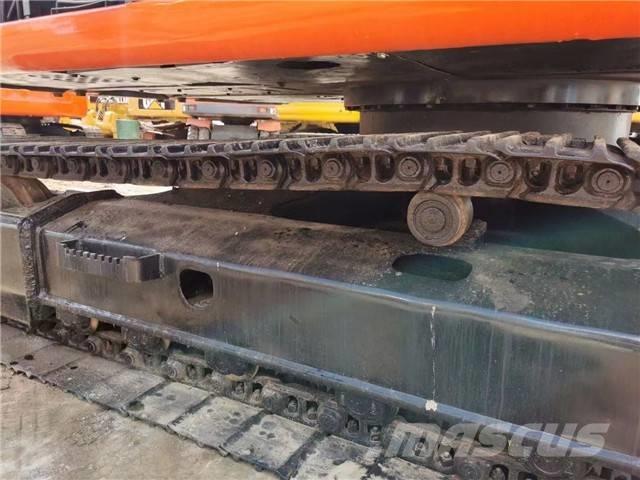 Hitachi EX 120 Gravemaskiner på larvebånd
