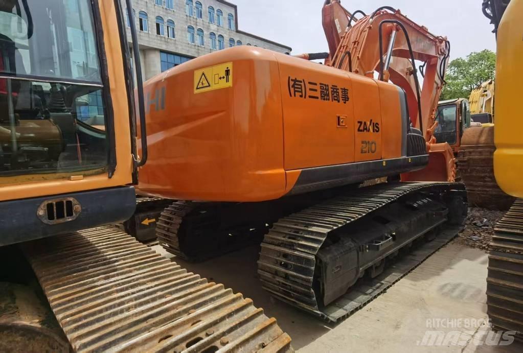 Hitachi ZX 210 Gravemaskiner på larvebånd