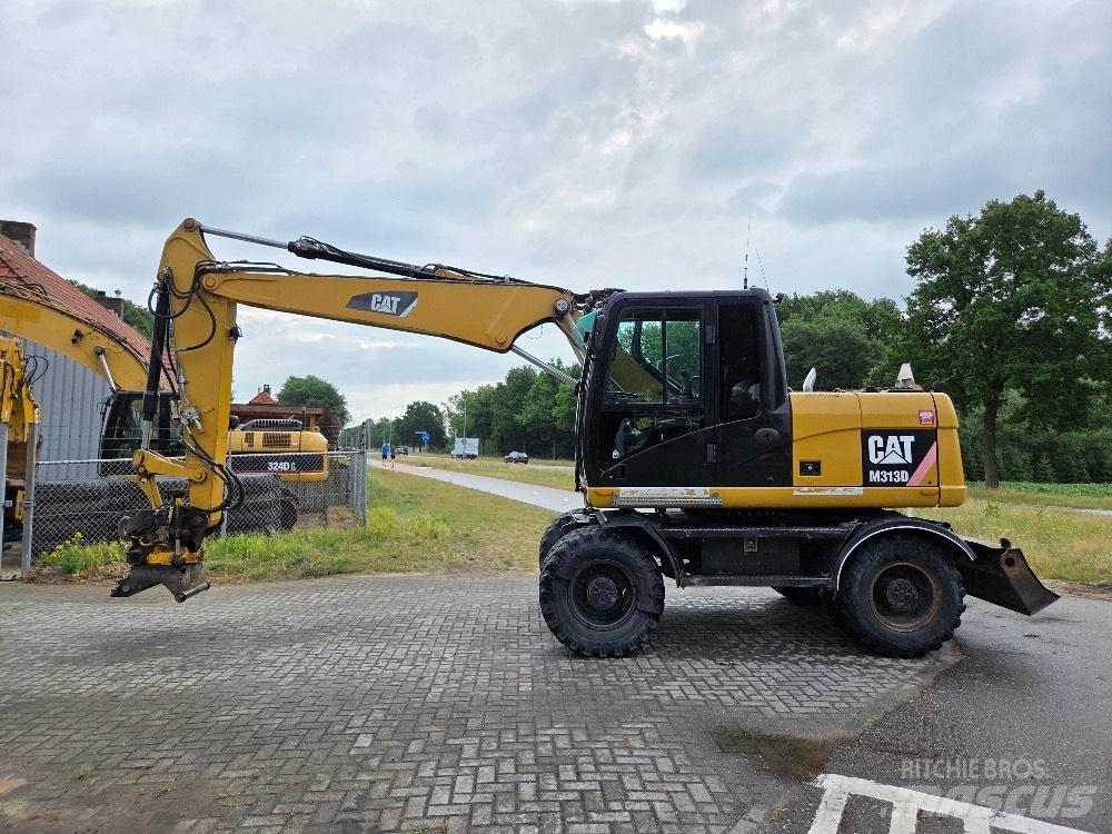 CAT M313D Gravemaskiner på hjul