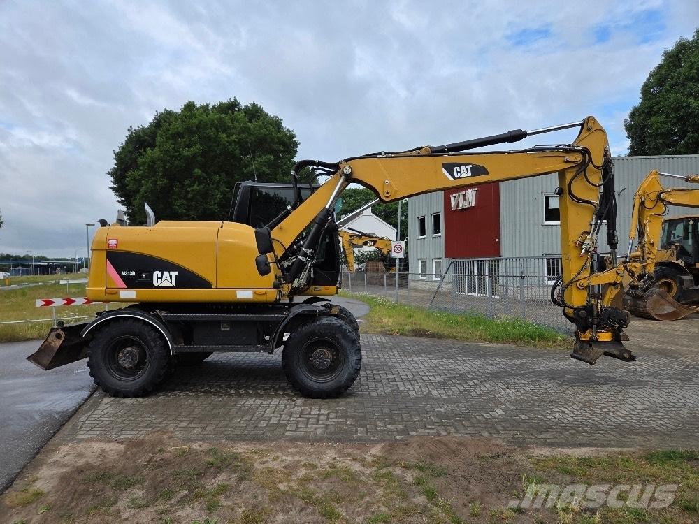 CAT M313D Gravemaskiner på hjul
