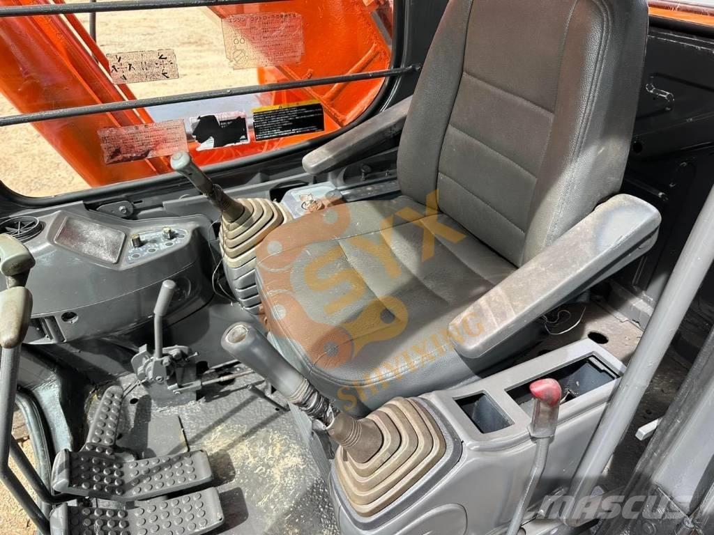 Hitachi EX 200 Gravemaskiner på larvebånd