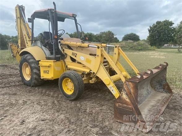 Komatsu WB140 Rendegravere
