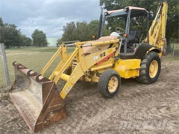 Komatsu WB140 Rendegravere