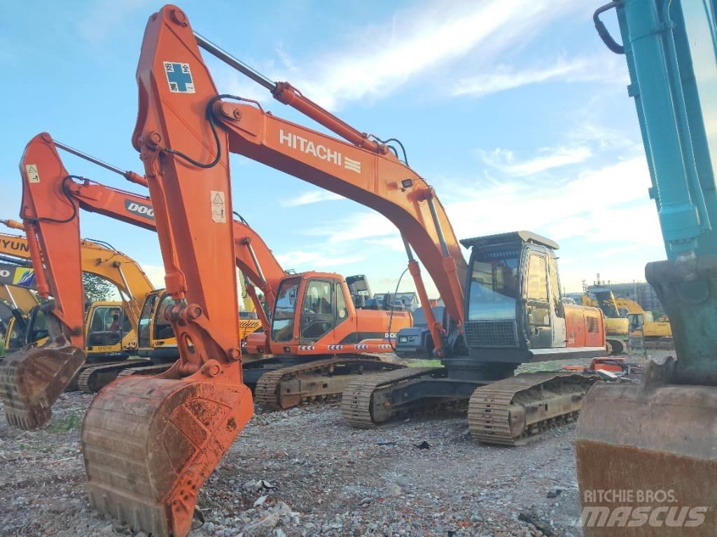 Hitachi ZX 210 Gravemaskiner på larvebånd