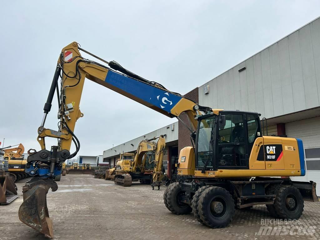 CAT M 318 F Gravemaskiner på hjul