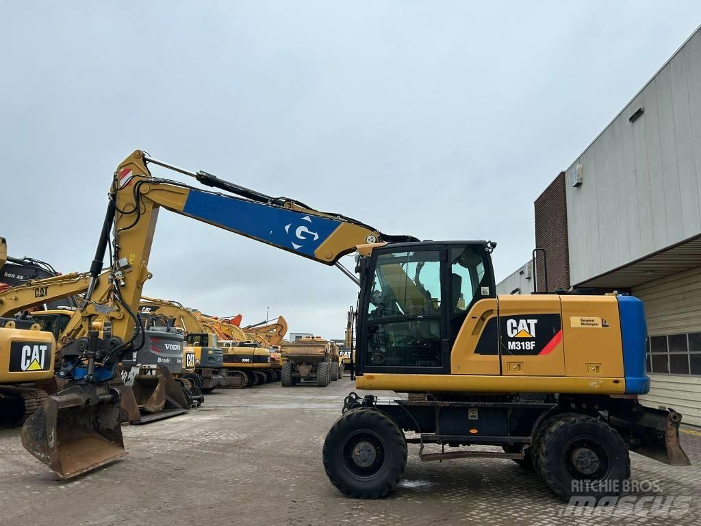 CAT M 318 F Gravemaskiner på hjul