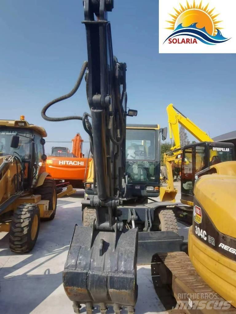 Hyundai R60W vs Minigravemaskiner