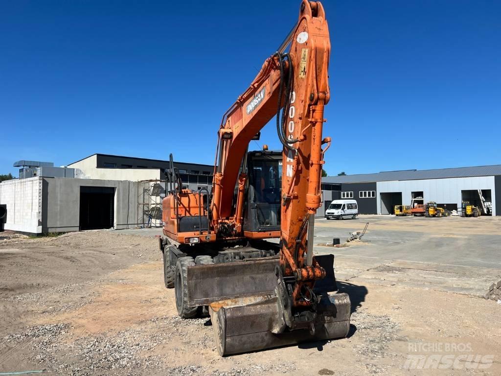 Doosan DX 140 W Gravemaskiner på hjul