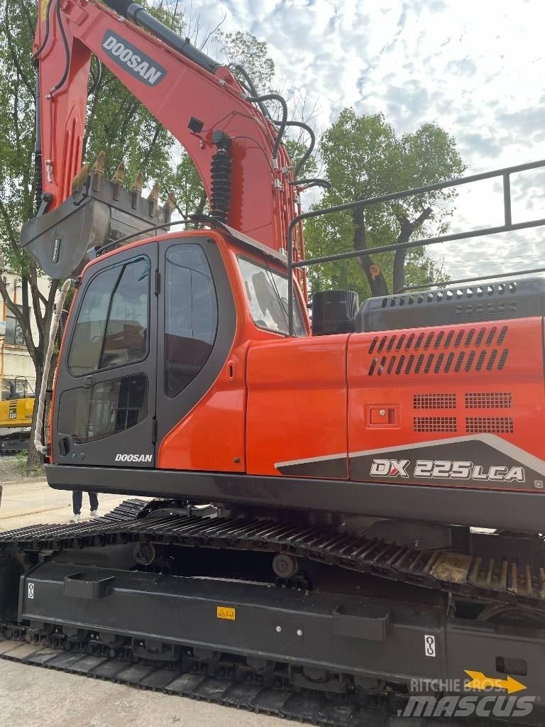 Doosan DX 225 Midi-gravemaskiner 7t - 12t