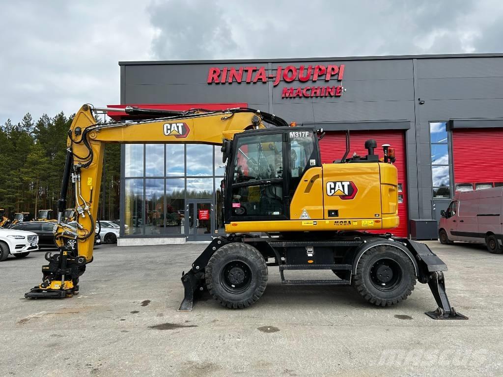 CAT M317F / Myyty, Sold Gravemaskiner på hjul