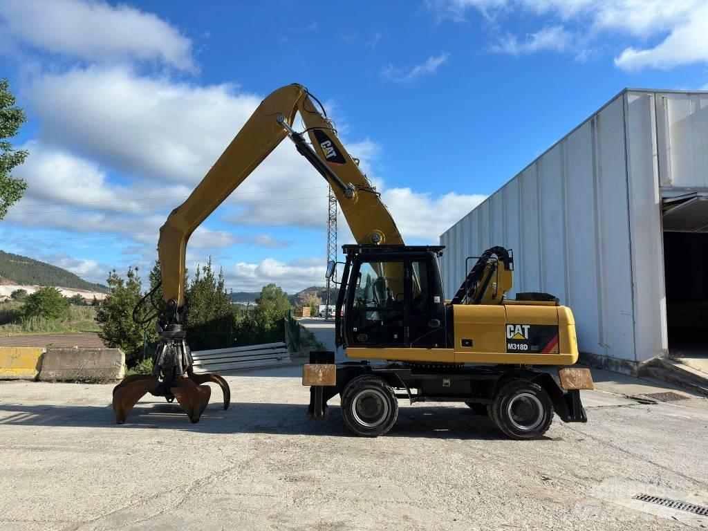 CAT M 318 MH Gravemaskiner på hjul