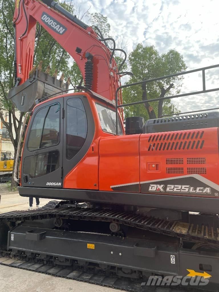 Doosan DX 225 Midi-gravemaskiner 7t - 12t