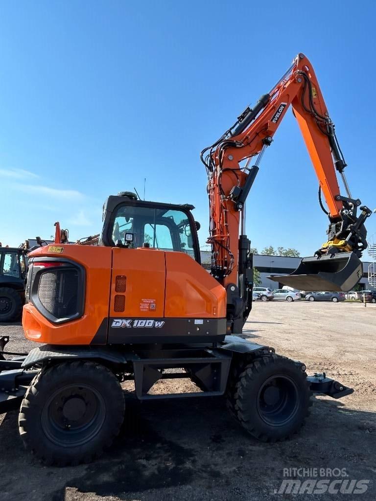 Develon DX 100 W-7 Gravemaskiner på hjul
