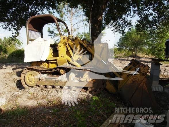 John Deere 450 Larvebåndslæssere