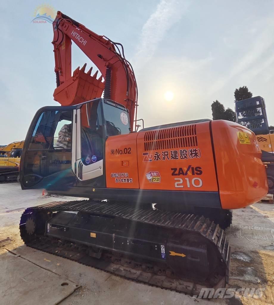 Hitachi ZX 210 Gravemaskiner på larvebånd