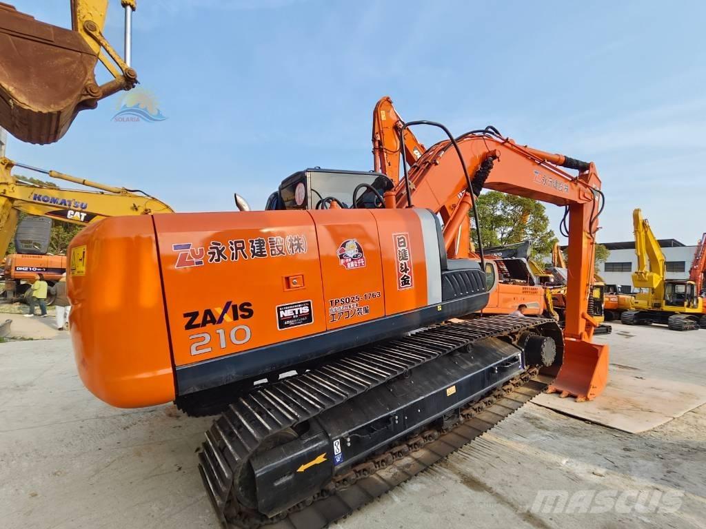 Hitachi ZX 210 Gravemaskiner på larvebånd