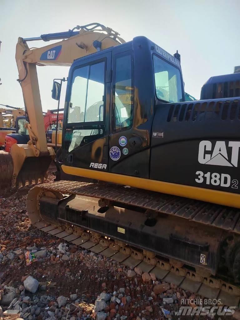 CAT 318 Gravemaskiner på larvebånd