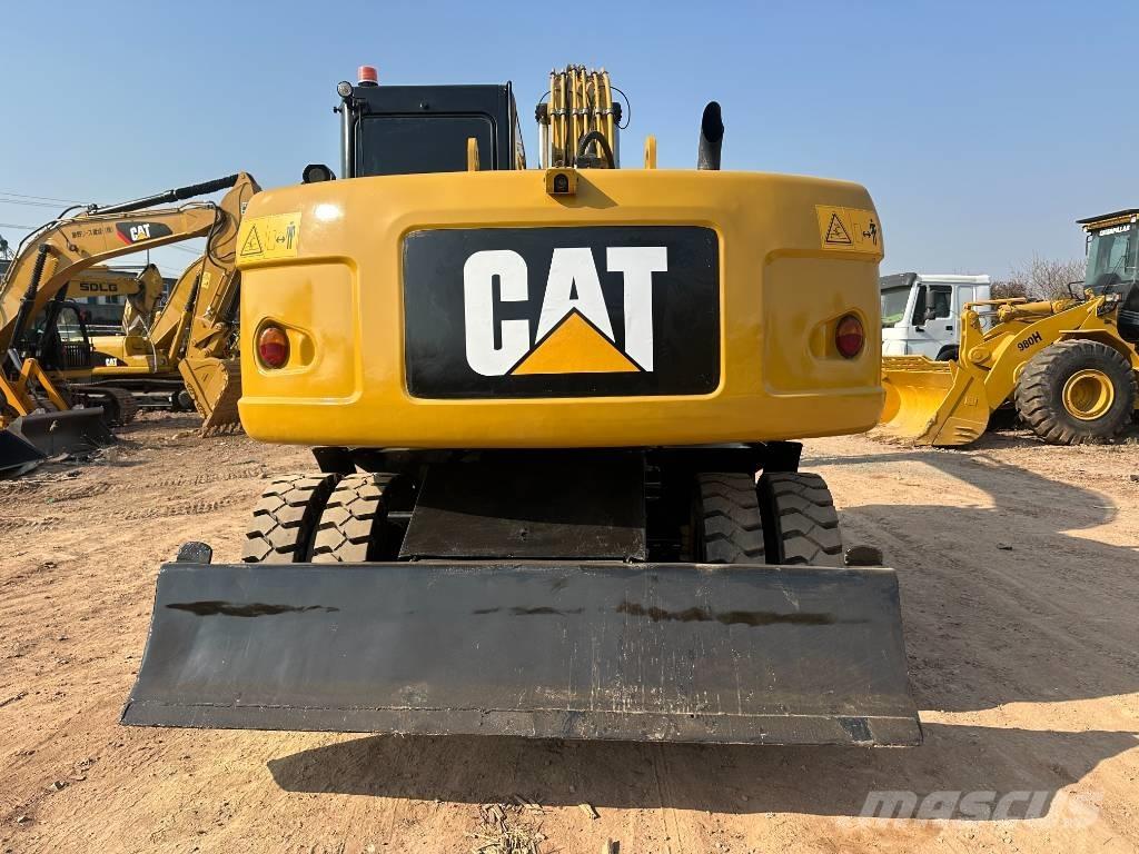 CAT M 320D Gravemaskiner på hjul