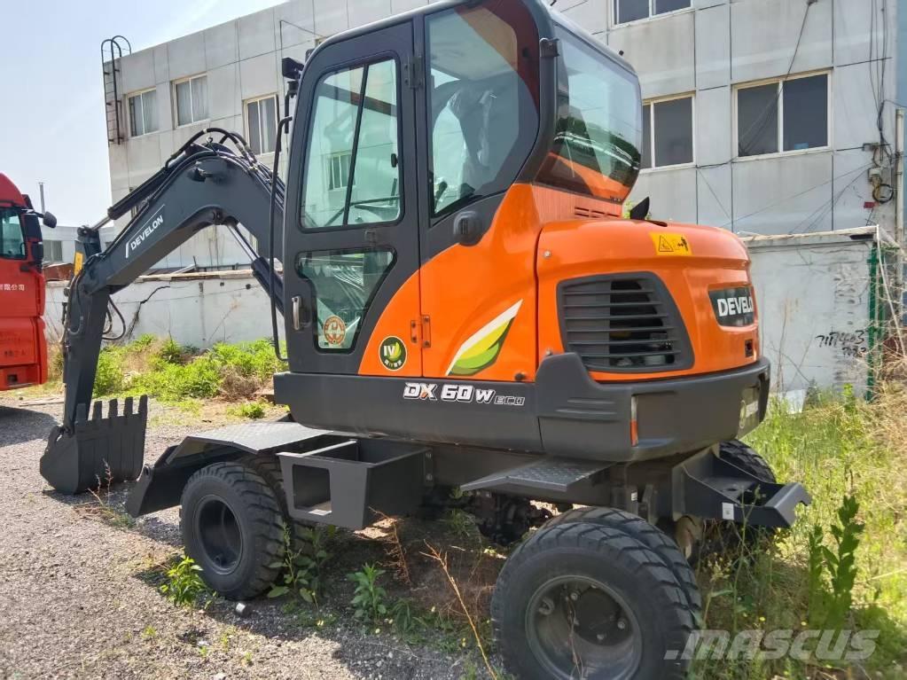 Develon DX60W ECO Gravemaskiner på hjul