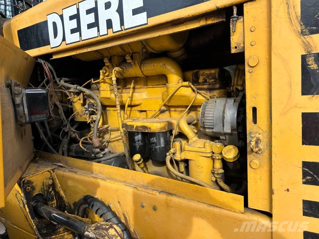 John Deere 640 D Udslæbningstraktorer