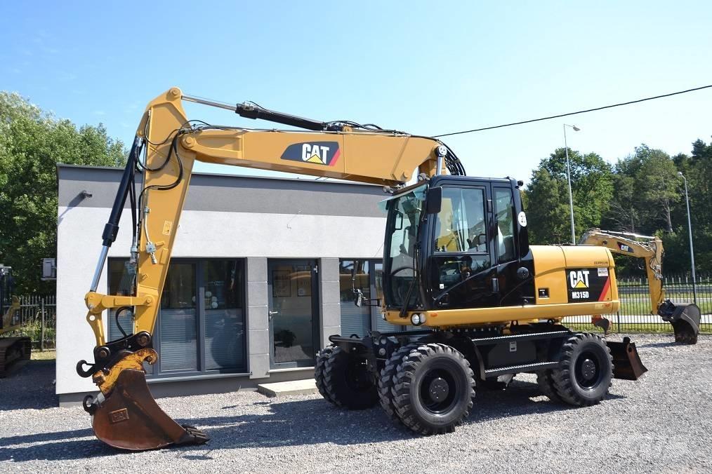 CAT M 315 D Gravemaskiner på hjul