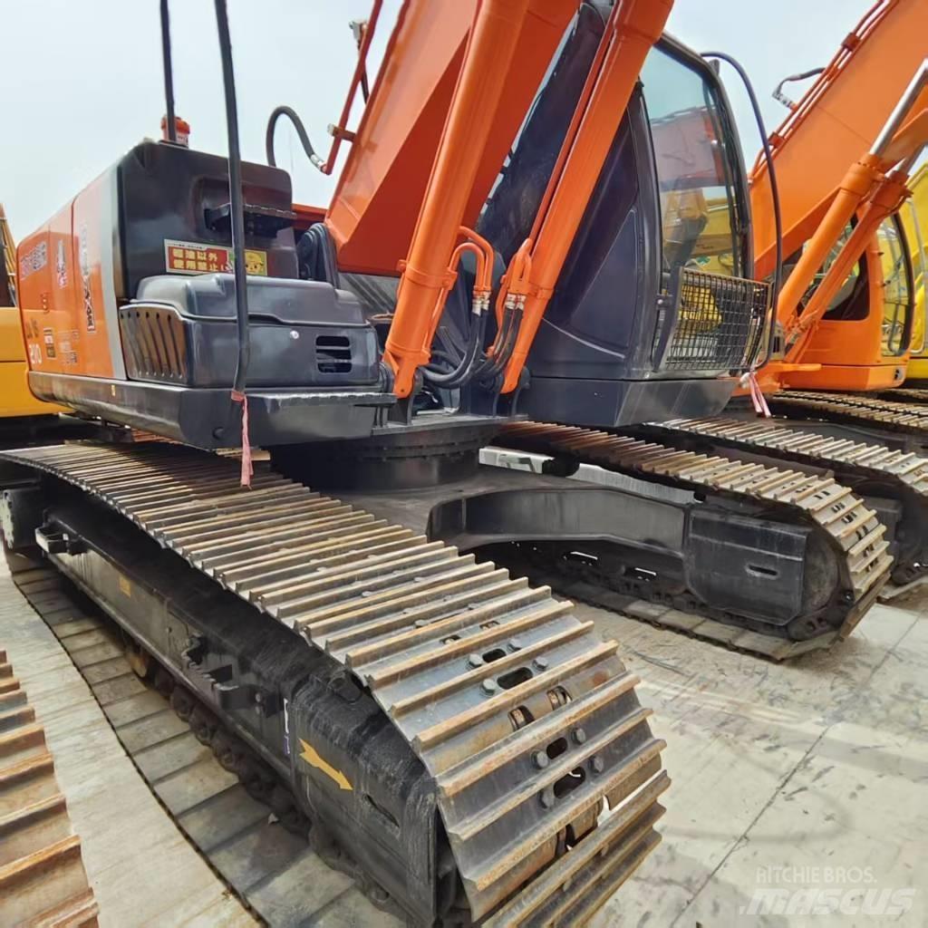 Hitachi ZX 210 Gravemaskiner på larvebånd