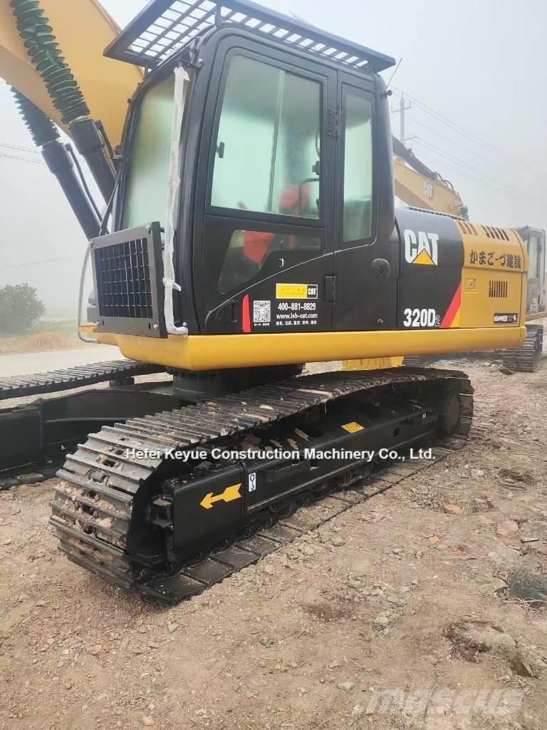 CAT 323 Gravemaskiner på larvebånd