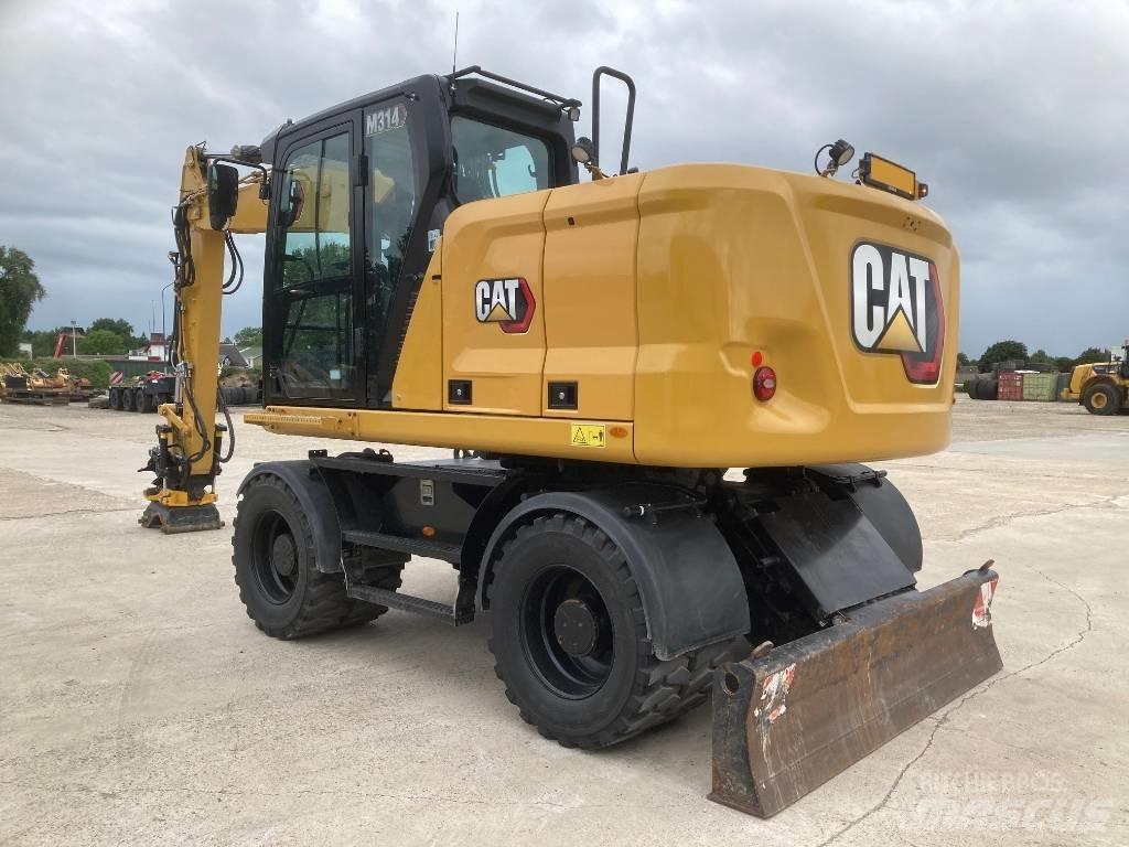 CAT M314 Gravemaskiner på hjul